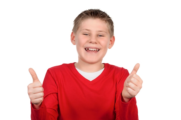 Free photo young boy giving you thumbs up isolated on white space