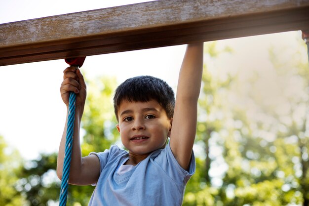 Young boy having fun in the playground