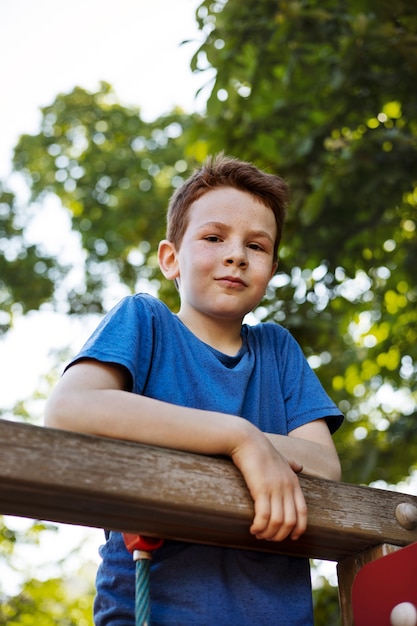 Young boy having fun in the playground