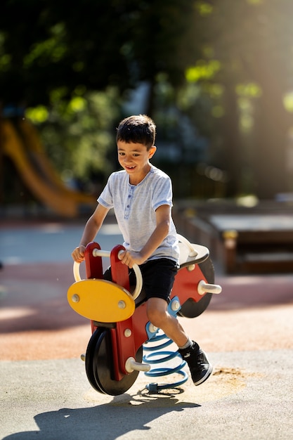 Young boy having fun in the playground