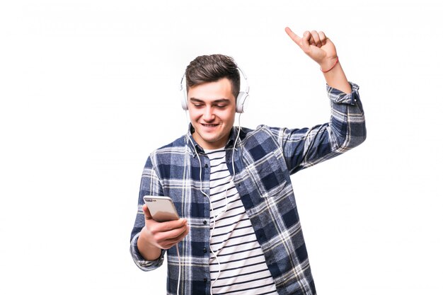 Young boy listening music with his new headphones