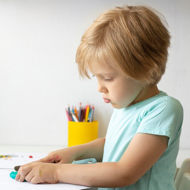Young boy painting