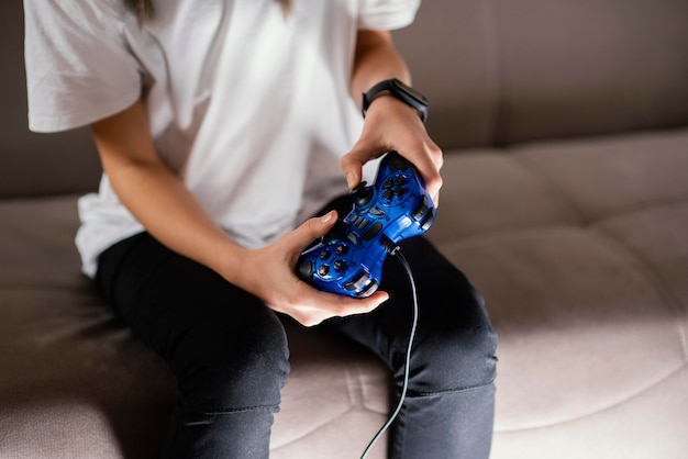 Young boy playing on joystick