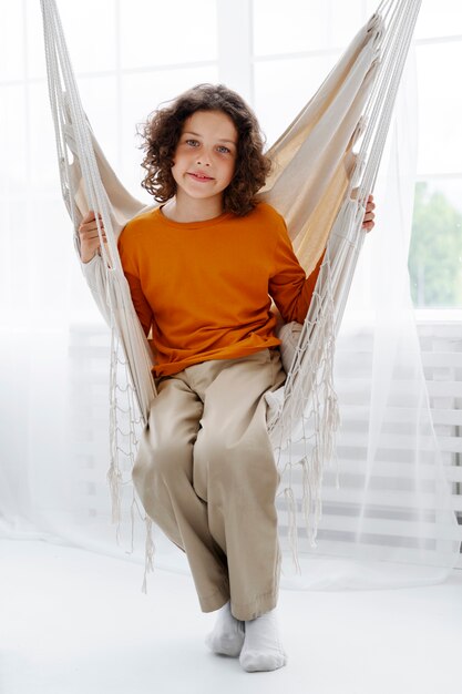 Young boy relaxing at home