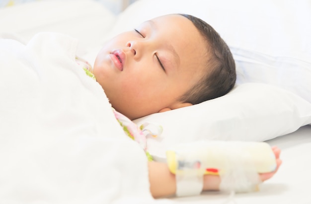 Young boy sleep and sickness stay in hospital