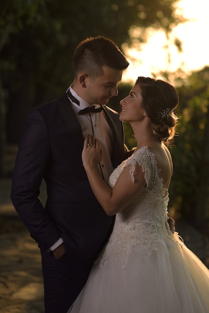 Young bride and groom in wedding dress