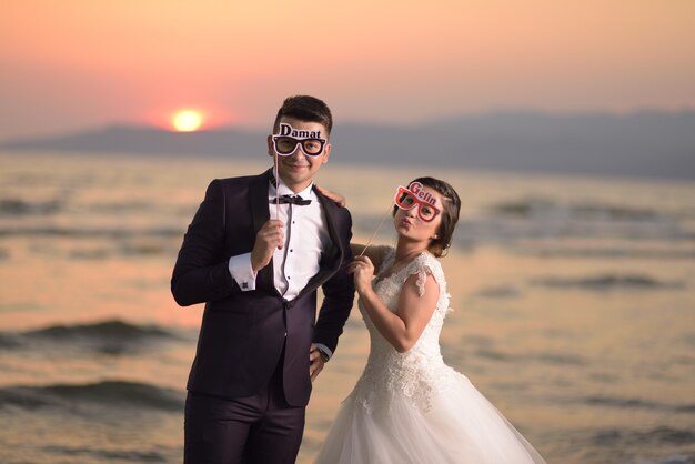 Young bride and groom in wedding dress