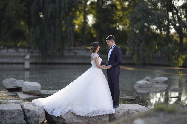 Young bride and groom in wedding dress