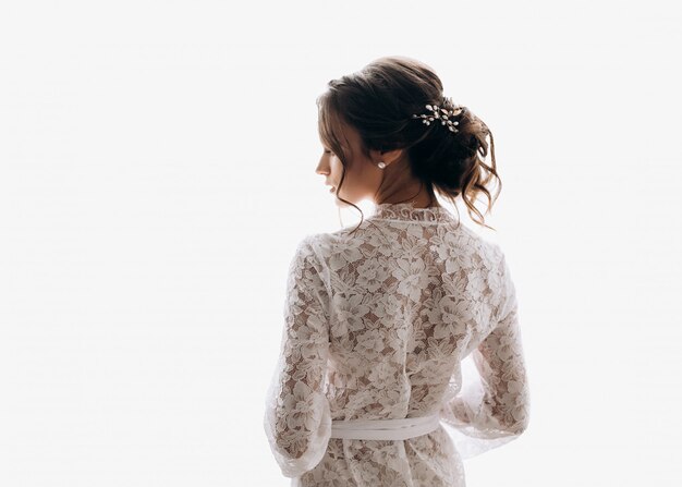 young bride wears a pretty wedding dress