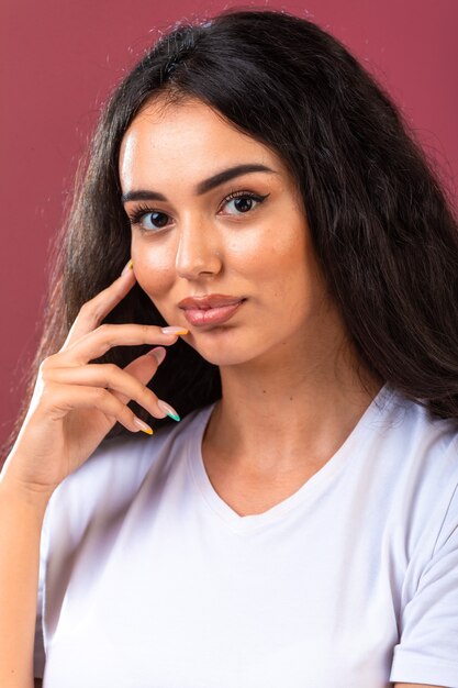 Young brunette girl promoting autumn makeup style and hairstyles