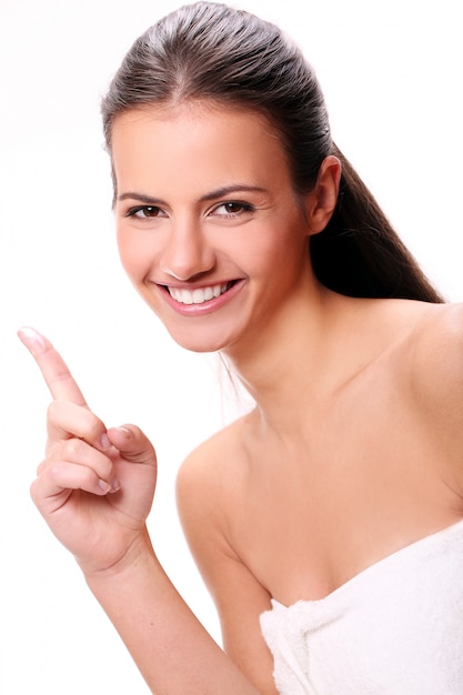 Young brunette woman after shower