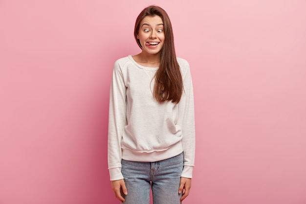 Young brunette woman wearing casual clothes