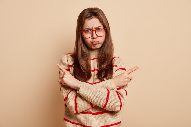 Young brunette woman wearing red eyeglasses