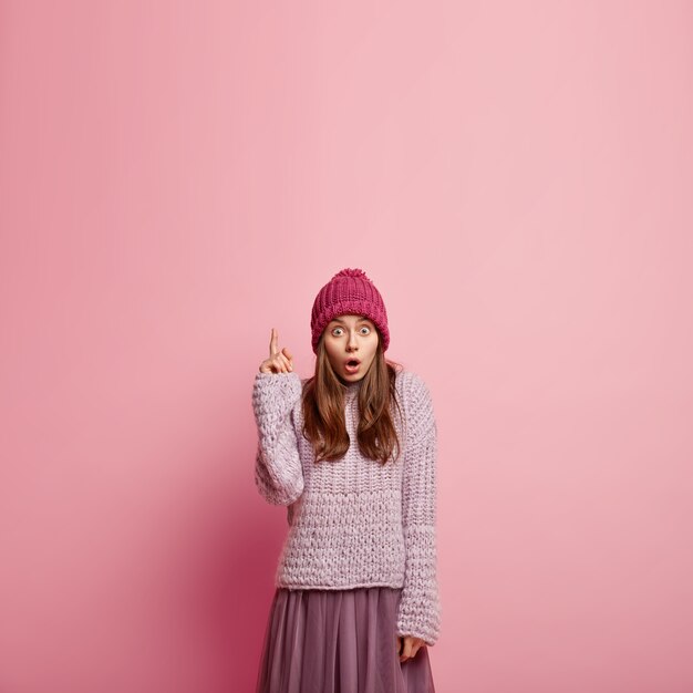 Young brunette woman in winter clothes