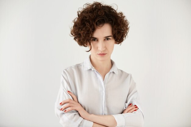 Young brunette woman with curly hair