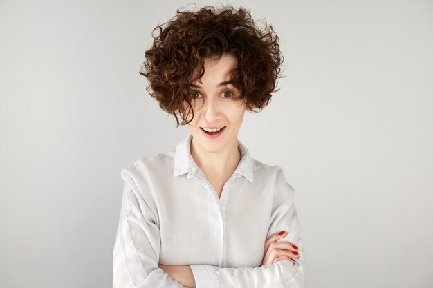 Young brunette woman with curly hair