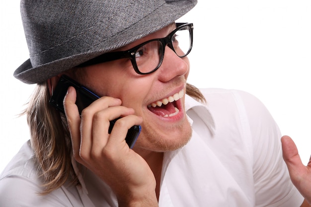 Free photo young business man using mobile phone on white