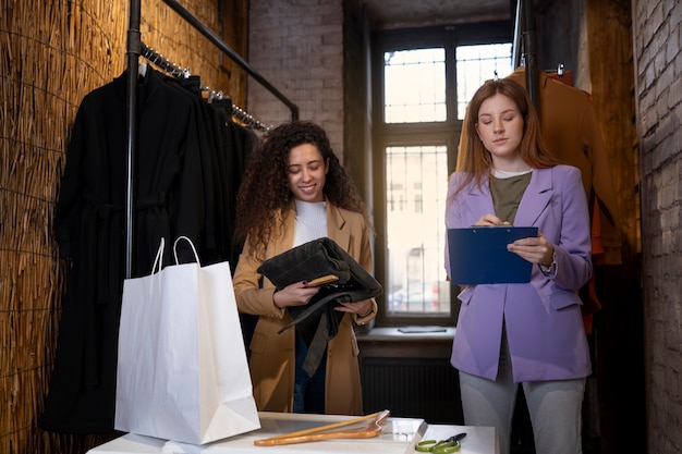 Young business owners preparing their store