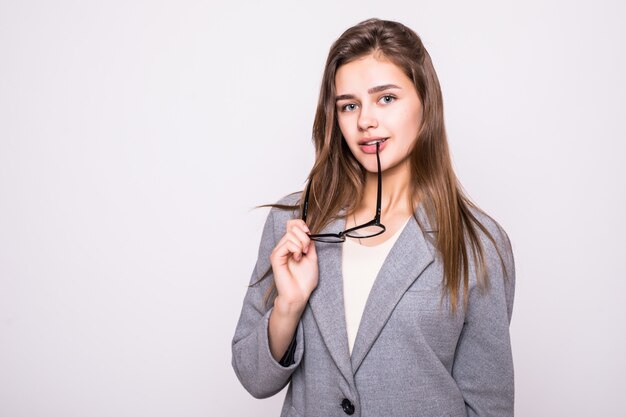 Young business woman in glasses isolated on white background