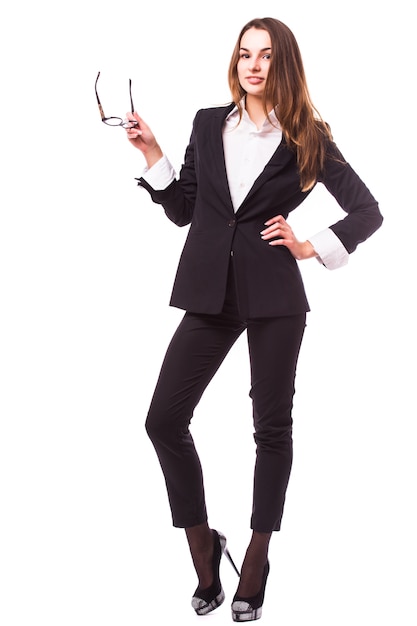 Young business woman in glasses isolated on white wall