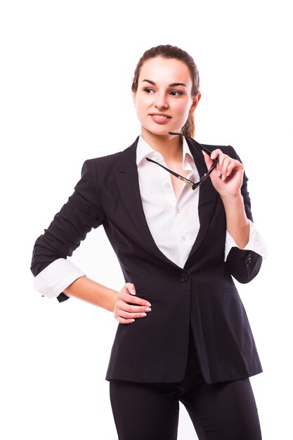 Young business woman in glasses isolated on white wall