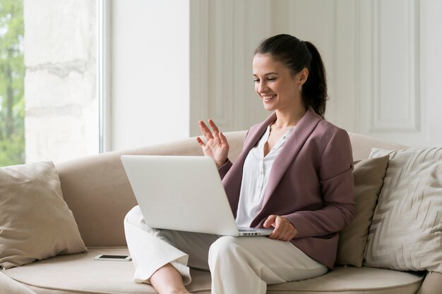 Young business woman having a video call