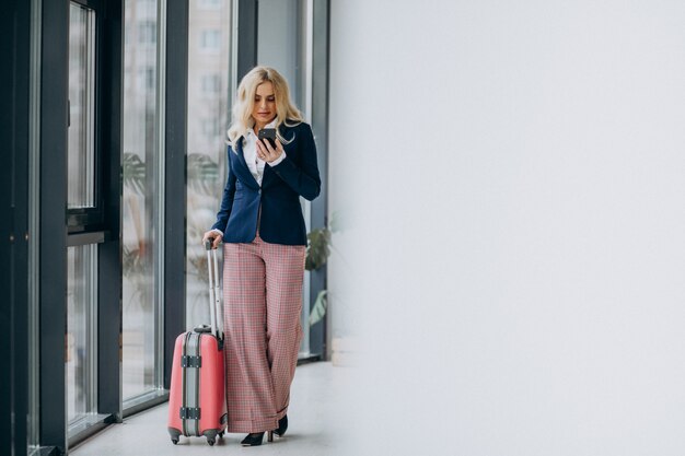 Young business woman travelling on business