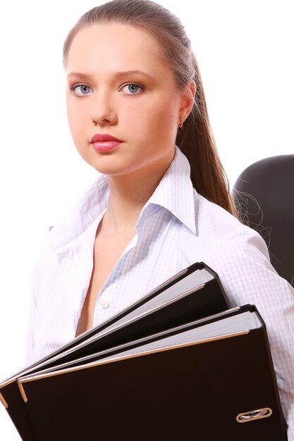 Young business woman with folders