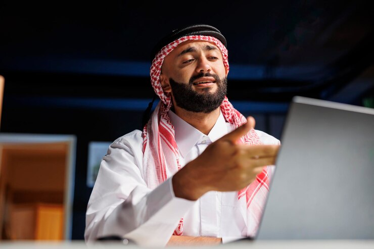 Free Photo young businessman using a digital laptop