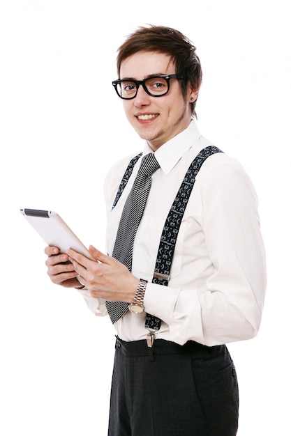 Free photo young businessman using tablet pc