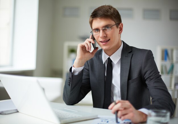 Young businessman very busy