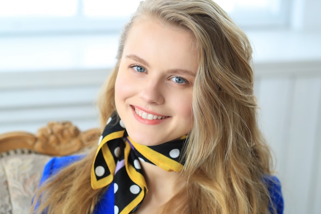 Young businesswoman in blue dress