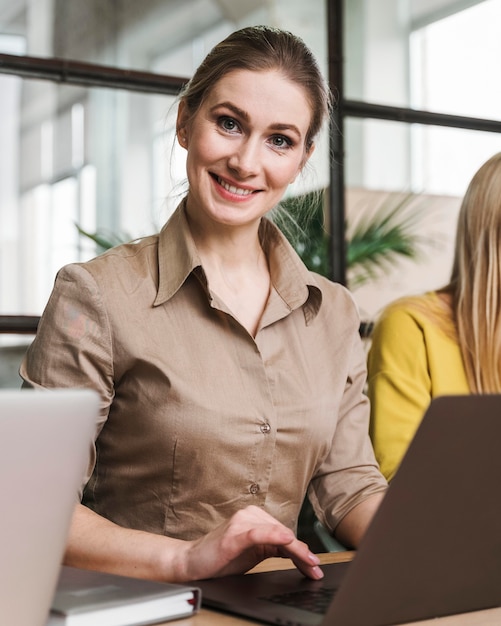 Young businesswoman posing during a meeting indoors