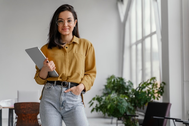 Young businesswoman posing with copy space