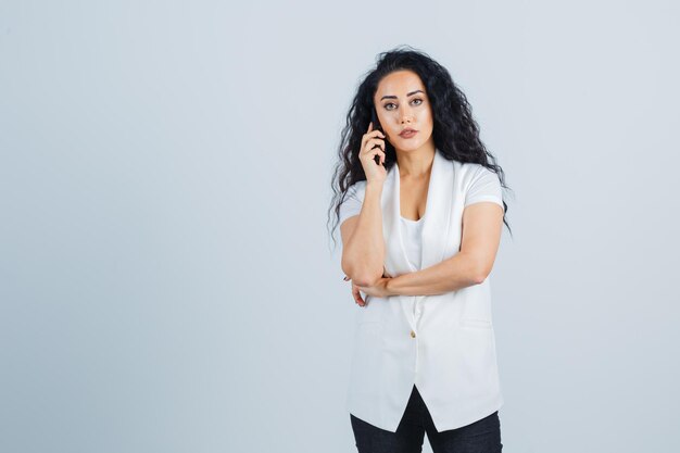 Young businesswoman using a phone