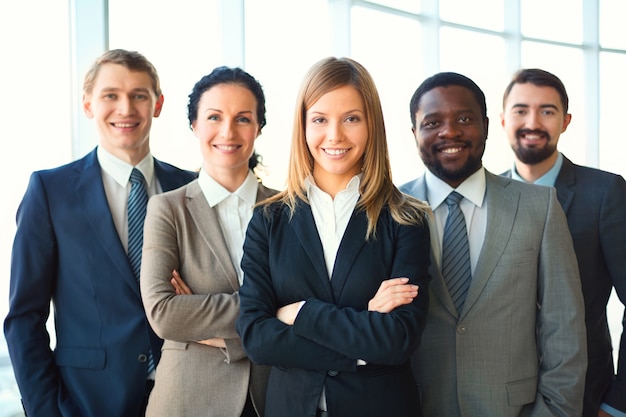 Young businesswoman with co-workers