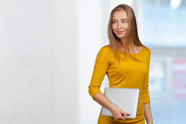 Young businesswoman with laptop