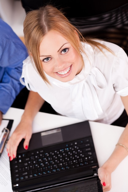 Young businesswoman working with laptop