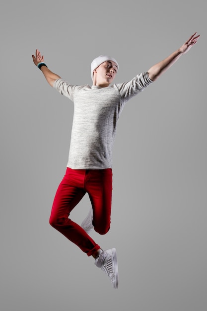 Free photo young carefree man jumping