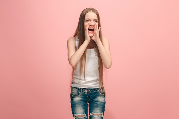 young casual teen girl shouting at studio