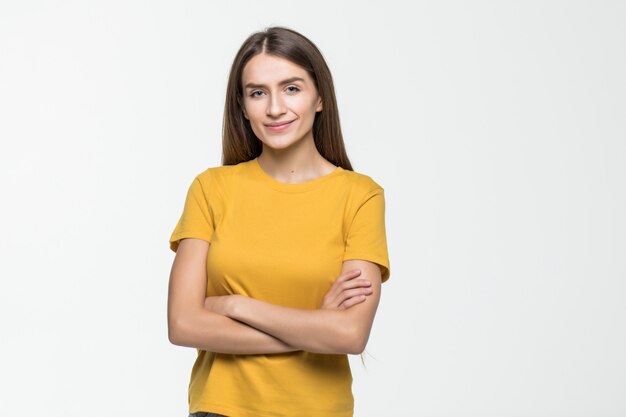 Young casual woman style isolated over white wall.