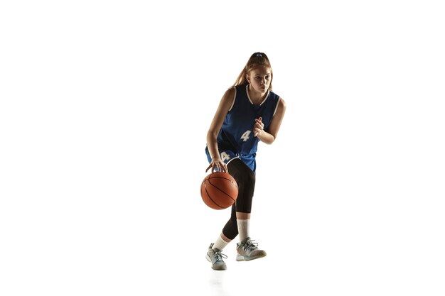 Young caucasian female basketball player of team in action, motion in run isolated on white background.