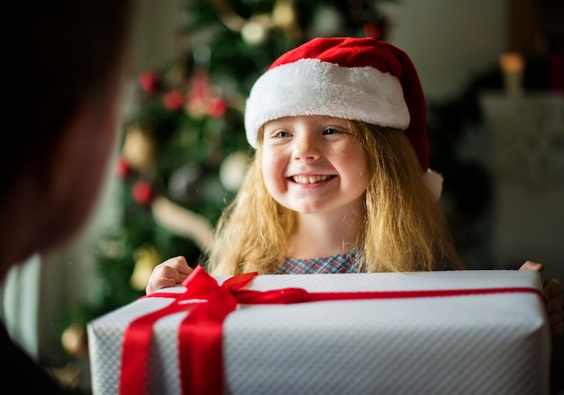 Young Caucasian girl enjoying Christmas holiday