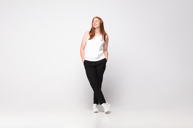 Free photo young caucasian woman in casual wear. bodypositive female character, plus size businesswoman