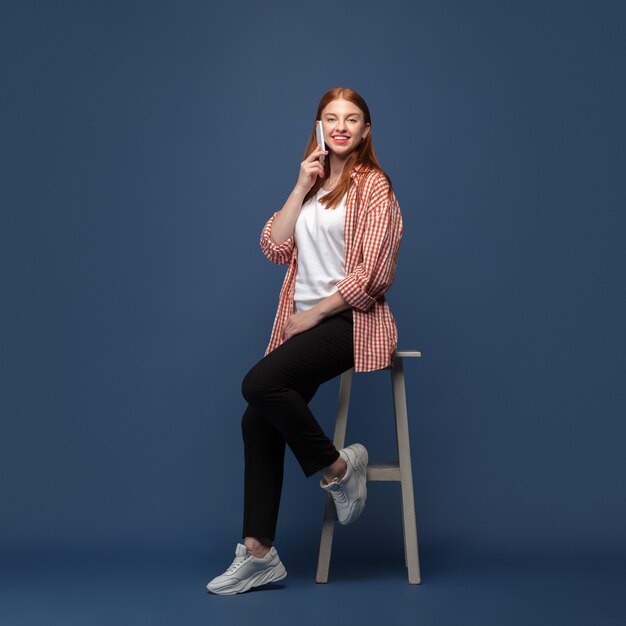 Young caucasian woman in casual wear calling