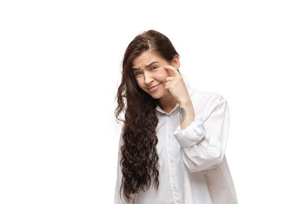 Young caucasian woman with funny, unusual popular emotions and gestures isolated on white