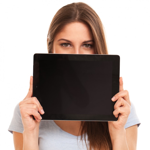 Free photo young caucasian woman with tablet pc