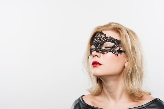 Free photo young charming blond lady in mask