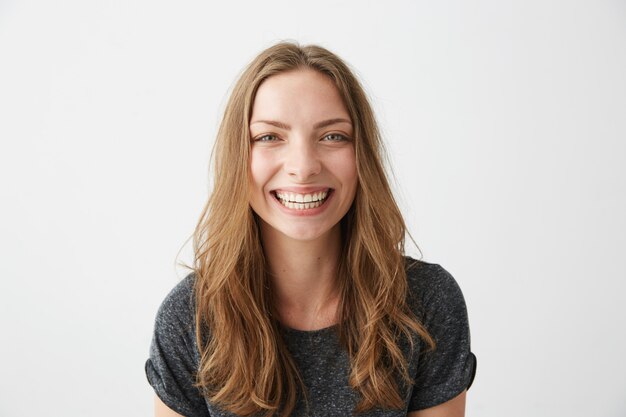 Young cheerful happy girl smiling laughing .