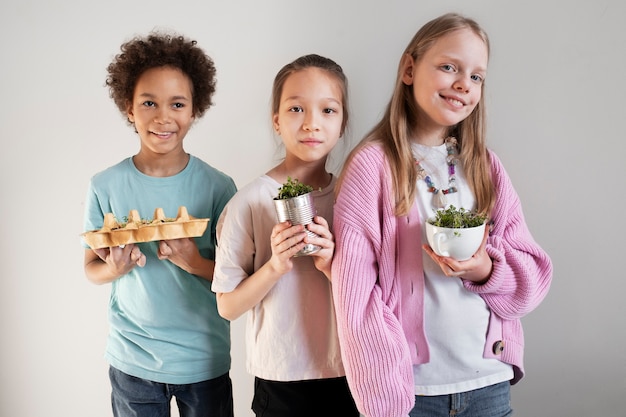 Young child making diy project from upcycled materials